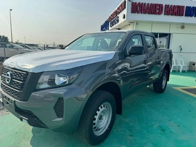 New Nissan Navara (Frontier) IV (D23), 2.3 l, 2023 in Dubai by Mohamed Hakim Motors, Silver color. GCC Specs | AUTO.AE