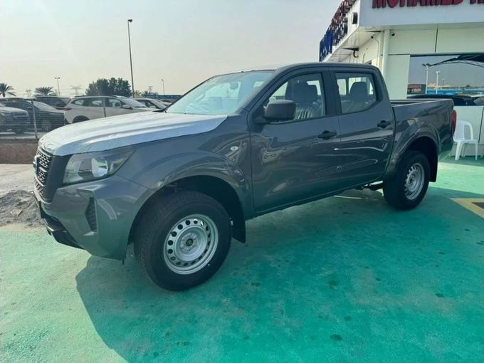 New Nissan Navara (Frontier) IV (D23), 2.3 l, 2023 in Dubai by Mohamed Hakim Motors, Silver color. GCC Specs | AUTO.AE