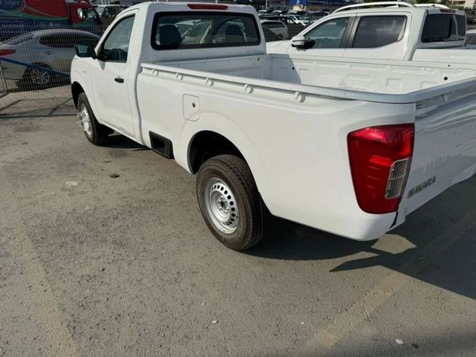 New Nissan Navara (Frontier) IV (D23), 2.5 l, 2023 in Dubai by Mohamed Hakim Motors, White color. GCC Specs | AUTO.AE