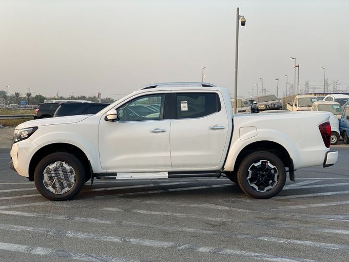 New Nissan Navara (Frontier) IV (D23), 2.5 l, 2025 in Dubai by MENAMOTORS, White color. Other | AUTO.AE