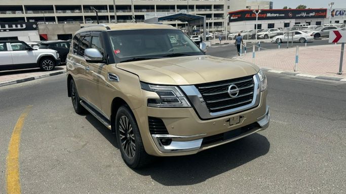 Подержанный Nissan Patrol VI (Y62), 5.6 л, 2012 в Дубае от Alhamd Motors Золотистый цвет. GCC | AUTO.AE