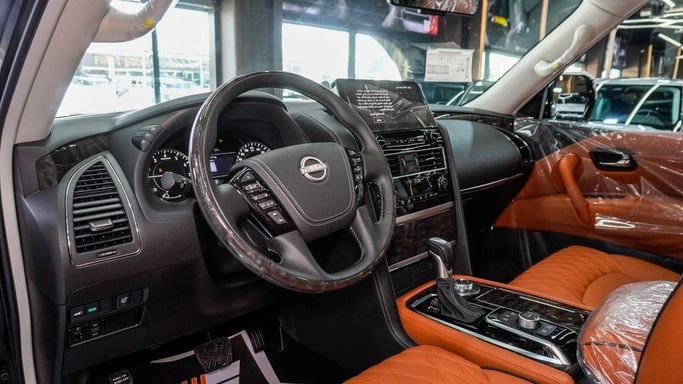 New Nissan Patrol VI (Y62) Facelift 2, 5.6 l, 2024 in Dubai by Najem Motors, Black color. GCC Specs | AUTO.AE