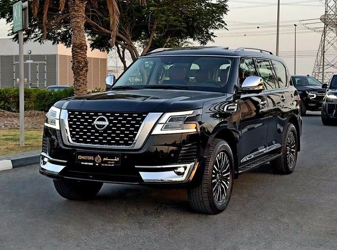 Used Nissan Patrol VI (Y62) Facelift 2, 4.0 l, 2023 in Dubai by Q Motors, Black color. GCC Specs | AUTO.AE