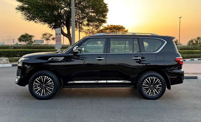 Used Nissan Patrol VI (Y62) Facelift 2, 4.0 l, 2023 in Dubai by Q Motors, Black color. GCC Specs | AUTO.AE