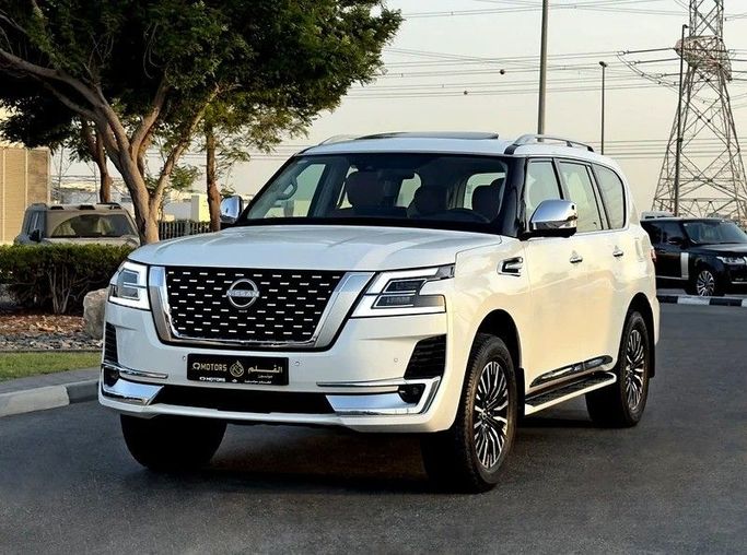 Used Nissan Patrol VI (Y62) Facelift 2, 5.6 l, 2024 in Dubai by Q Motors, White color. GCC Specs | AUTO.AE