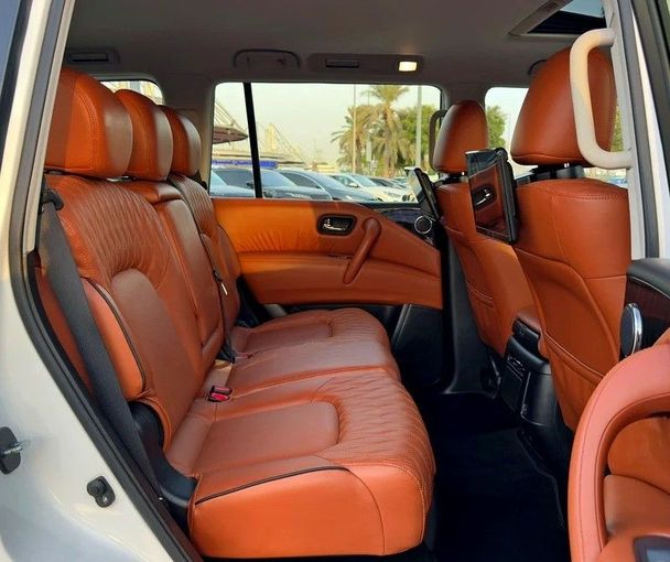Used Nissan Patrol VI (Y62) Facelift 2, 5.6 l, 2024 in Dubai by Q Motors, White color. GCC Specs | AUTO.AE