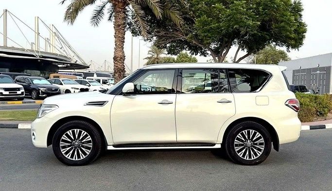 Used Nissan Patrol VI (Y62), 5.6 l, 2012 in Dubai by Q Motors, White color. GCC Specs | AUTO.AE