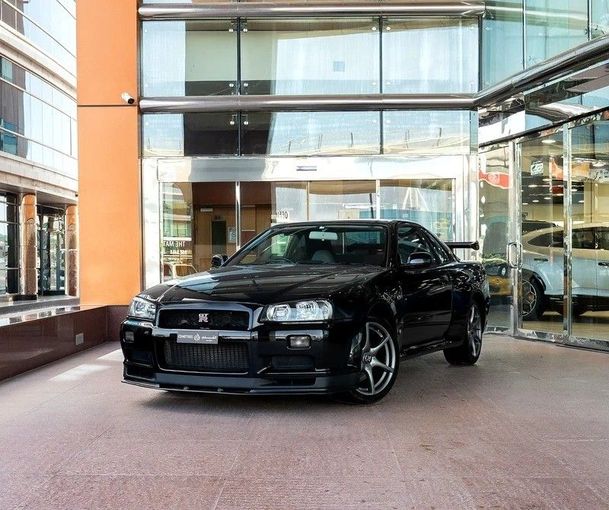 Used Nissan Skyline GT-R X (R34), 2.6 l, 1999 in Dubai by Q Motors, Black color. Japanese Specs | AUTO.AE