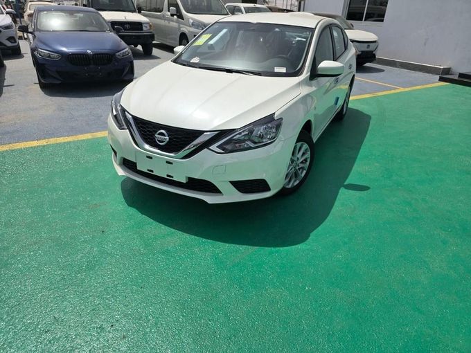 New Nissan Sunny N18 Facelift, 1.6 l, 2024 in Dubai by Mohamed Hakim Motors, White color. Chinese Specs | AUTO.AE