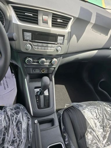 New Nissan Sunny N18 Facelift, 1.6 l, 2024 in Dubai by Mohamed Hakim Motors, White color. Chinese Specs | AUTO.AE