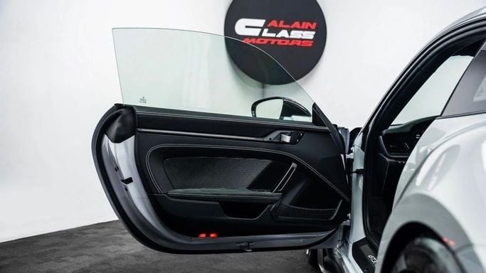 Подержанный Porsche 911 GT3 RS 992, 4.0 л, 2024 в Дубае от Al Ain Class Motors Серый цвет. GCC | AUTO.AE