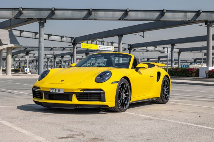 Porsche 911 Carrera GTS VIII (992), 2023 кабриолет спорт класса в Дубае от POF RENTAL желтый цвет | AUTO.AE