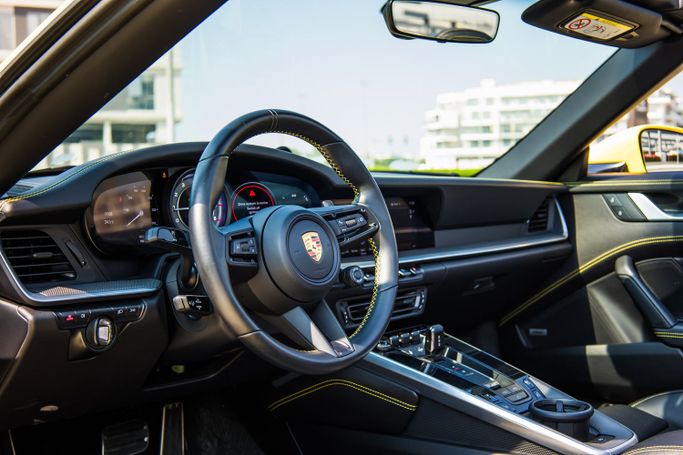 Porsche 911 Carrera GTS VIII (992), 2023 رياضي قابلة للتحويل للتأجير في في دبي من POF RENTAL، اللون أصفر | AUTO.AE