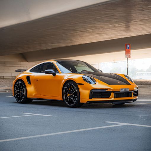 Porsche 911 Turbo VIII (992), 2023 купе спорт класса в Дубае от Macan Luxury Motors оранжевый цвет | AUTO.AE