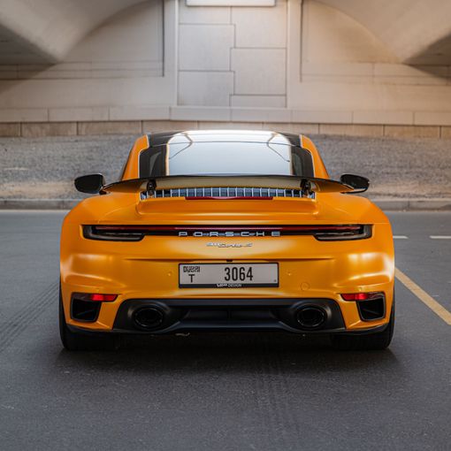 Porsche 911 Turbo VIII (992), 2023 رياضي كوبيه للتأجير في في دبي من Macan Luxury Motors، اللون برتقالي | AUTO.AE