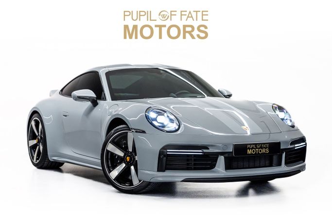 New Porsche 911 VIII (992), 3.7 l, 2022 in Dubai by PUPIL OF FATE MOTORS, Grey color. GCC Specs | AUTO.AE