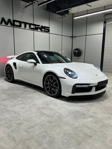 Подержанный Porsche 911 Turbo VIII (992), 3.7 л, 2022 в Дубае от AAA Motors Белый цвет. GCC | AUTO.AE