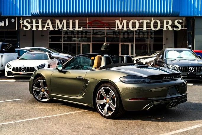 Подержанный Porsche Boxster S IV 718 (982), 2.5 л, 2023 в Дубае от Shamil Motors Зеленый цвет. Американская | AUTO.AE