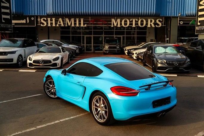 Used Porsche Cayman S II (981), 3.4 l, 2015 in Dubai by Shamil Motors, Light Blue color. Japanese Specs | AUTO.AE