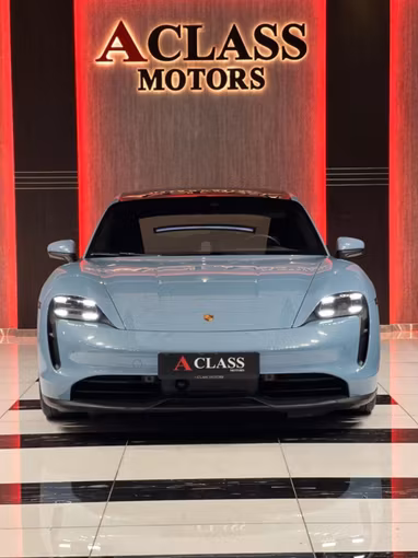 Used Porsche Taycan I, 2022 in Dubai by A Class Motors, Light Blue color.  | AUTO.AE