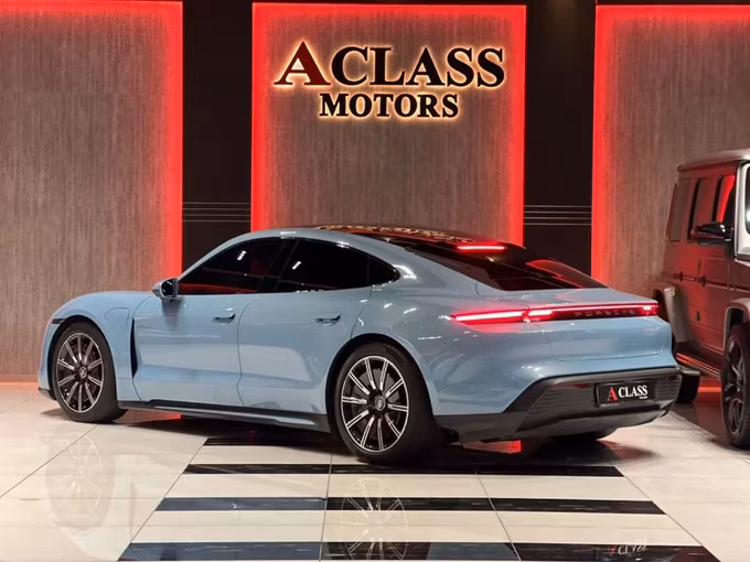 Used Porsche Taycan I, 2022 in Dubai by A Class Motors, Light Blue color.  | AUTO.AE