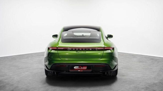 Used Porsche Taycan 4S I, 2021 in Dubai by Al Ain Class Motors, Green color. European Specs | AUTO.AE