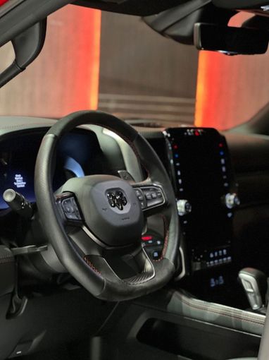 Подержанный RAM 1500 Crew Cab TRX V, 6.2 л, 2024 в Дубае от A Class Motors Красный цвет.  | AUTO.AE