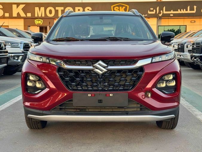 New Suzuki Fronx, 1.5 l, 2025 in Dubai by SK Motors, Red color. GCC Specs | AUTO.AE