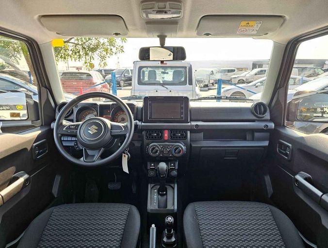 New Suzuki Jimny IV, 1.5 l, 2024 in Dubai by SK Motors, Grey color. GCC Specs | AUTO.AE