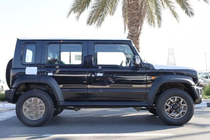 New Suzuki Jimny IV, 1.5 l, 2024 in Dubai by Top Euro Cars, Black color.  | AUTO.AE
