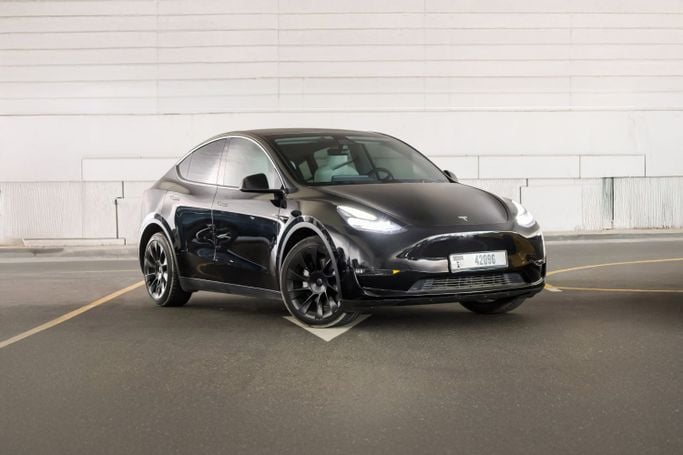 Tesla Model Y Long Range I, 2023 внедорожник 5 дв. электро класса в Дубае от Macan Luxury Motors черный цвет | AUTO.AE