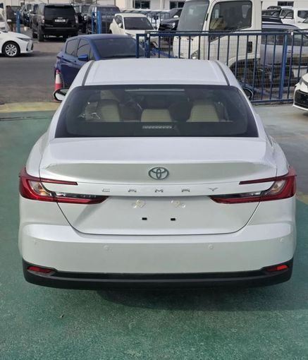 New Toyota Camry IX (XV80), 2.5 l, 2025 in Dubai by Mohamed Hakim Motors, White color. GCC Specs | AUTO.AE