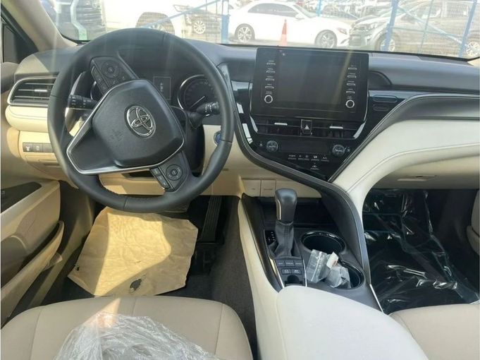 New Toyota Camry VIII (XV70) Facelift, 2.5 l, 2024 in Dubai by Mohamed Hakim Motors, Black color. GCC Specs | AUTO.AE