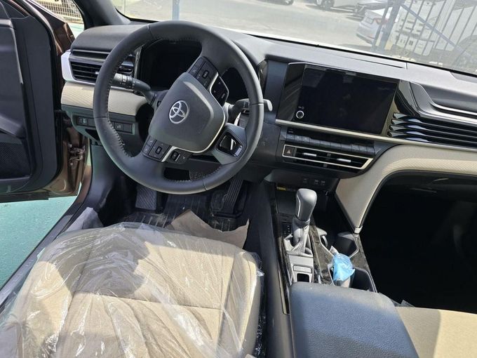 New Toyota Camry IX (XV80), 2.5 l, 2025 in Dubai by Mohamed Hakim Motors, Bronze color. GCC Specs | AUTO.AE