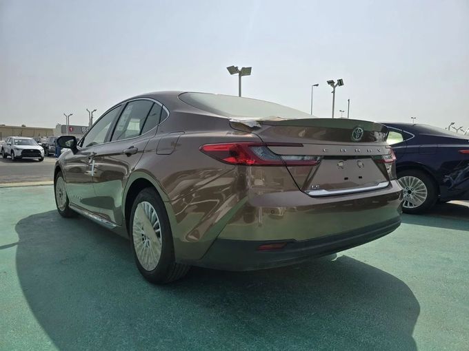 New Toyota Camry IX (XV80), 2.5 l, 2025 in Dubai by Mohamed Hakim Motors, Bronze color. GCC Specs | AUTO.AE