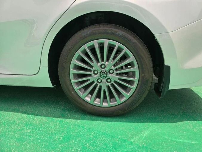 New Toyota Camry IX (XV80) China Market, 2.0 l, 2024 in Dubai by Mohamed Hakim Motors, White color. Chinese Specs | AUTO.AE