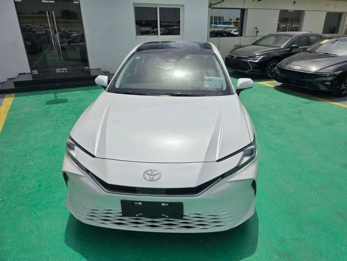 New Toyota Camry IX (XV80) China Market, 2.0 l, 2024 in Dubai by Mohamed Hakim Motors, White color. Chinese Specs | AUTO.AE