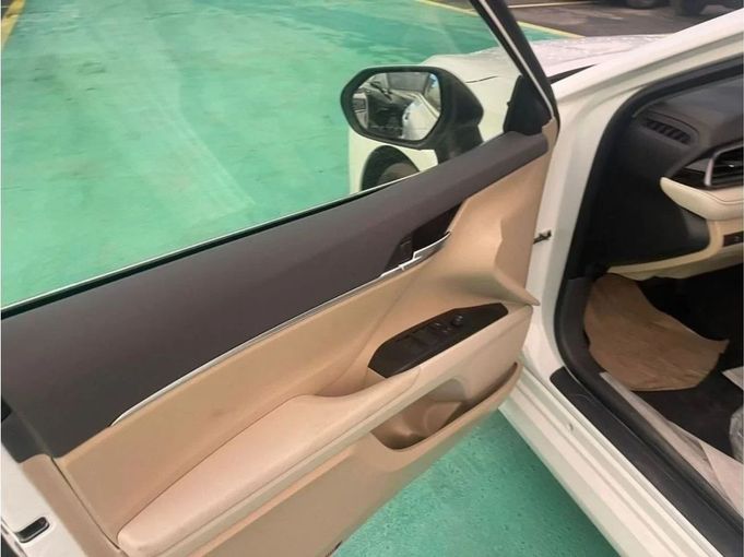 New Toyota Camry IX (XV80), 2.5 l, 2024 in Dubai by Mohamed Hakim Motors, White color. GCC Specs | AUTO.AE