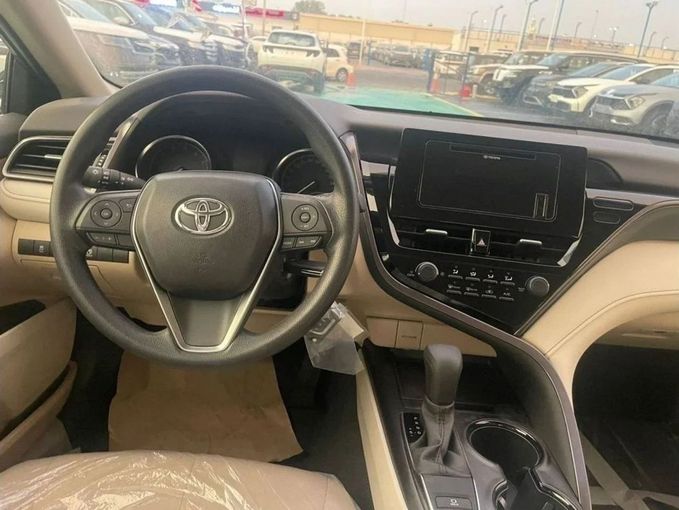 New Toyota Camry IX (XV80), 2.5 l, 2024 in Dubai by Mohamed Hakim Motors, White color. GCC Specs | AUTO.AE