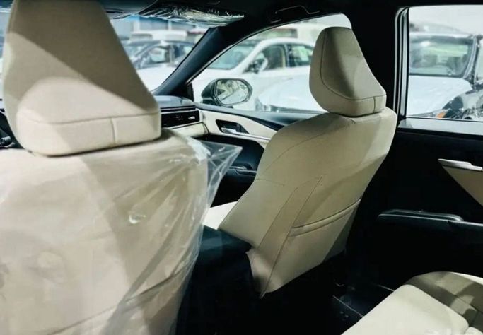New Toyota Camry IX (XV80), 2.5 l, 2024 in Dubai by Mohamed Hakim Motors, Navy Blue color. GCC Specs | AUTO.AE