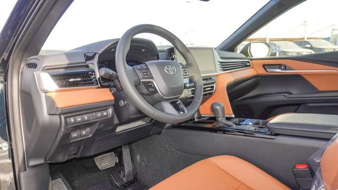New Toyota Camry IX (XV80), 2.5 l, 2025 in Dubai by Najem Motors, Black color. GCC Specs | AUTO.AE