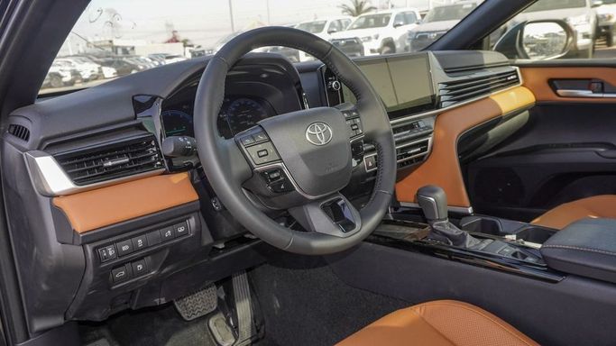New Toyota Camry IX (XV80), 2.5 l, 2025 in Dubai by Najem Motors, Black color. GCC Specs | AUTO.AE