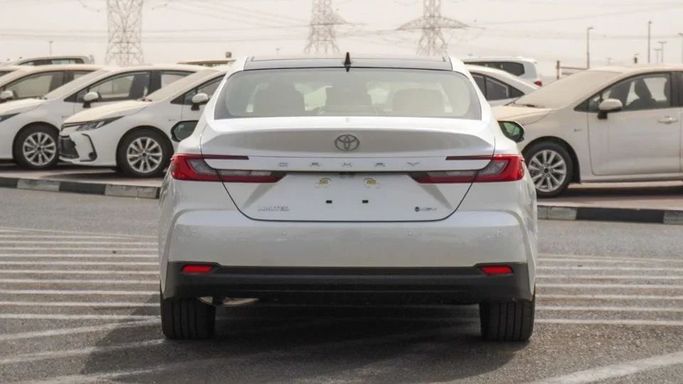 New Toyota Camry IX (XV80), 2.5 l, 2025 in Dubai by Najem Motors, White color. GCC Specs | AUTO.AE