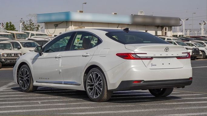 New Toyota Camry VIII (XV70) Facelift, 2.5 l, 2025 in Dubai by Najem Motors, White color. GCC Specs | AUTO.AE
