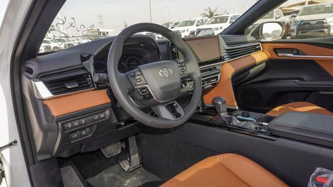 New Toyota Camry VIII (XV70) Facelift, 2.5 l, 2025 in Dubai by Najem Motors, White color. GCC Specs | AUTO.AE