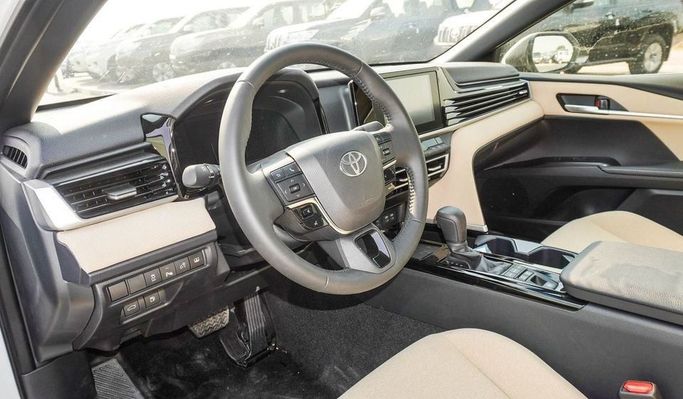 New Toyota Camry VIII (XV70) Facelift, 2.5 l, 2025 in Dubai by Najem Motors, White color. GCC Specs | AUTO.AE