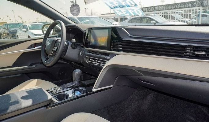 New Toyota Camry IX (XV80), 2.5 l, 2025 in Dubai by Najem Motors, White color. GCC Specs | AUTO.AE