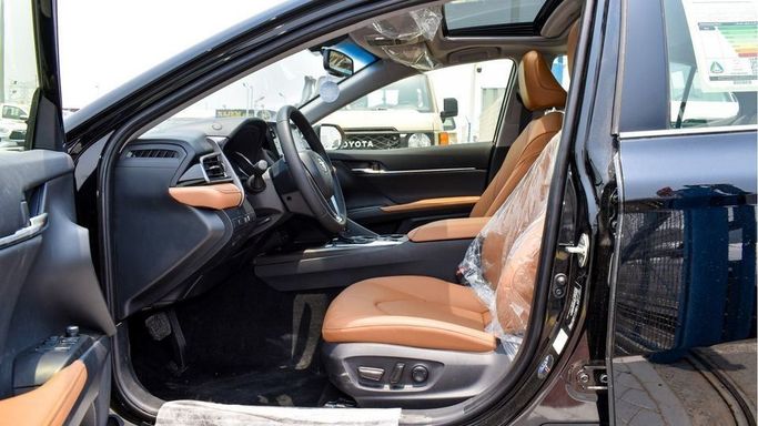 New Toyota Camry IX (XV80), 2.5 l, 2024 in Dubai by Najem Motors, Black color. GCC Specs | AUTO.AE