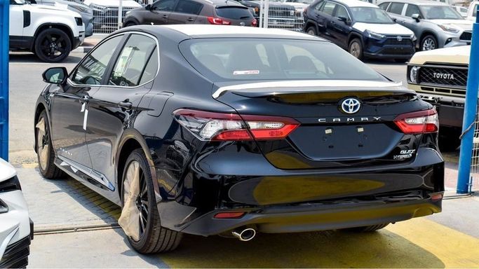 New Toyota Camry IX (XV80), 2.5 l, 2024 in Dubai by Najem Motors, Black color. GCC Specs | AUTO.AE
