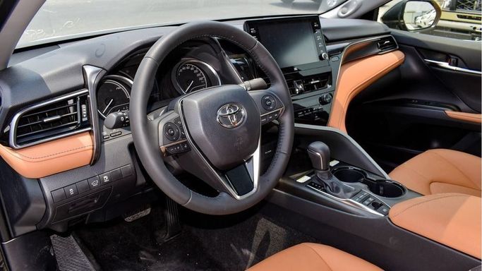 New Toyota Camry IX (XV80), 2.5 l, 2024 in Dubai by Najem Motors, Black color. GCC Specs | AUTO.AE